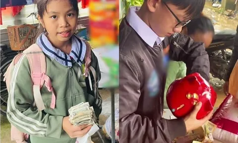 Xúc động hình ảnh cô bé mang xấp tiền lẻ gửi ủng hộ bà con vùng lũ